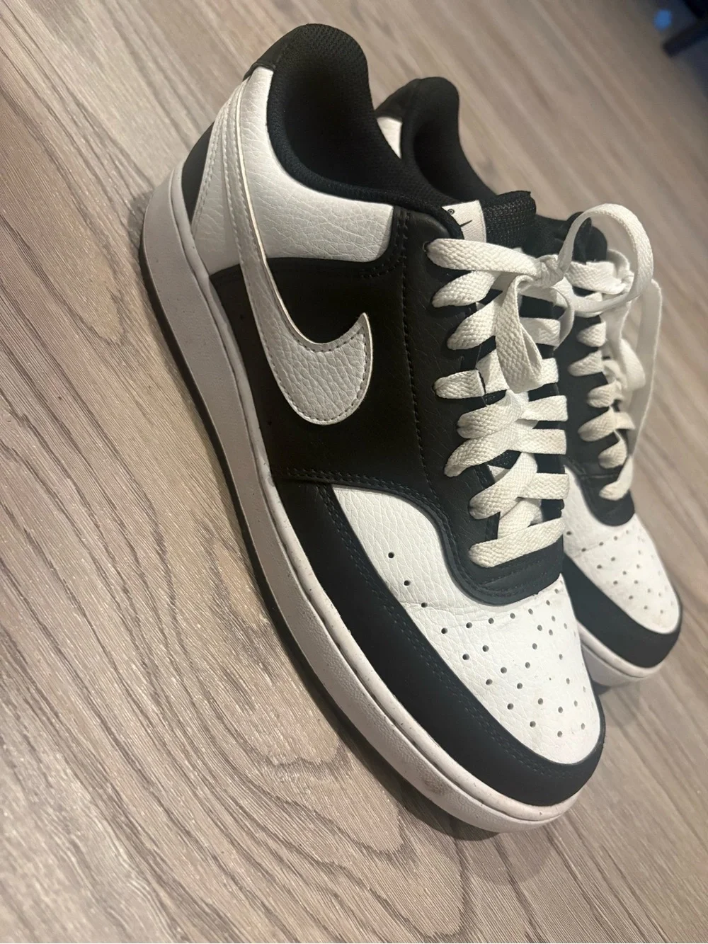 Nike Women’s Black and White Low-Top Sneakers with White Swoosh